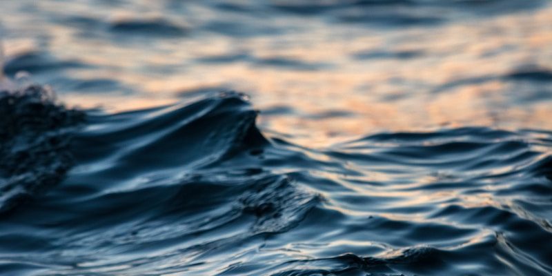 long exposure photography of body of water